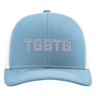Light blue cap with 'TGBTG' text embroidered on the front in white. 